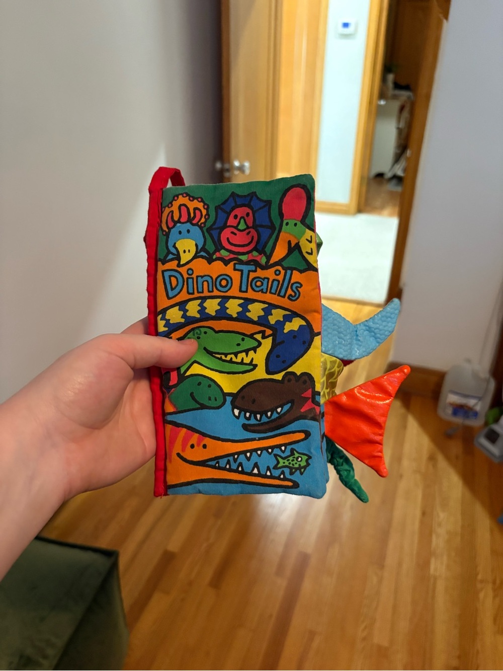 Jellycat Dino Tails Soft Activity Book - Red, Orange, Blue, Green